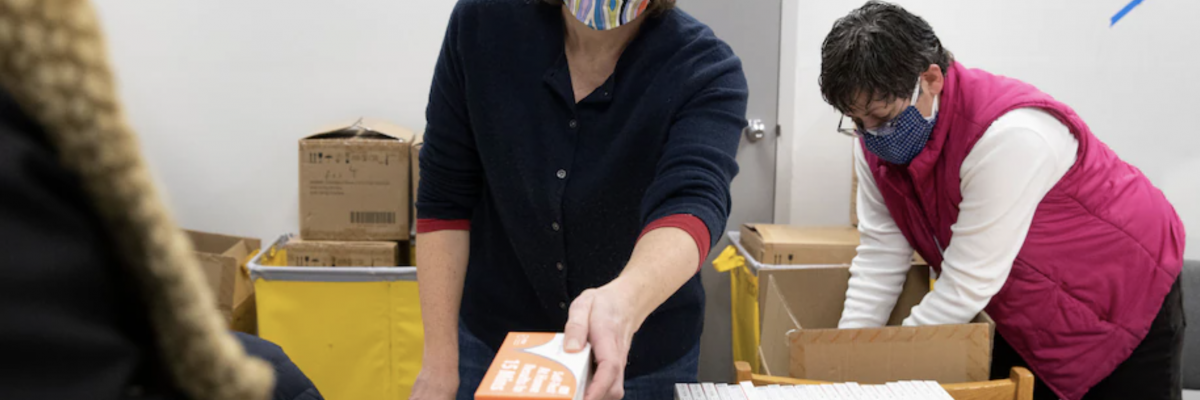 Mandatory Credit: Photo by MICHAEL REYNOLDS/EPA-EFE/Shutterstock (12761168q) Free at home antigen rapid coronavirus tests are distributed to members of the public at a library in Silver Spring, Md., on Friday. (Michael Reynolds/EPA-EFE/REX/Shutterstock)