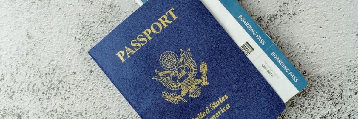 Photo of a U.S. Passport and boarding pass.