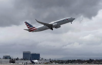 An American Airlines plane takes off from Los Angeles International Airport earlier this month. (Daniel Slim/AFP via Getty Images)