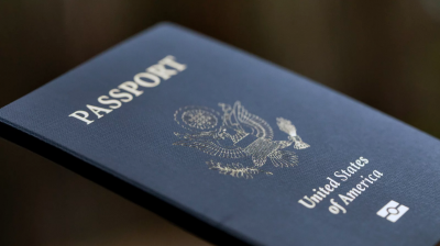A new executive order from President Biden calls on the State Department to create a system where passports can be renewed online. Jenny Kane/AP