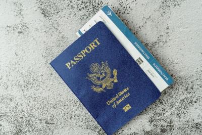 Photo of a U.S. Passport and boarding pass.