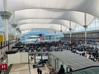 Crowded security line at Denver International Airport. Photo by Jared King