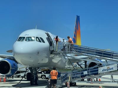 Passenger boarding an aircraft.