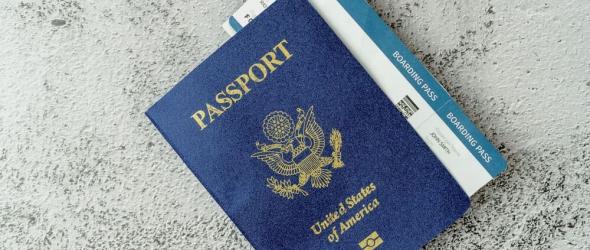 Photo of a U.S. Passport and boarding pass.