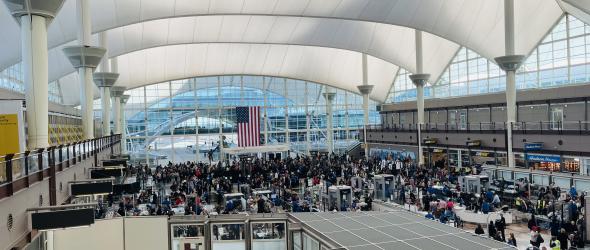 Crowded security line at Denver International Airport. Photo by Jared King